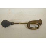 An early brass car horn, 19" long