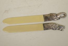 Two faux bone letter openers with silver plated handles modelled as horse and elephant heads, 10½"