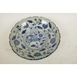 A Chinese blue and white porcelain bowl decorated with an exotic beast and lotus flowers, 6