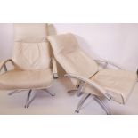 A pair of contemporary reclining leather and tubular metal reclining chairs and matching footstools