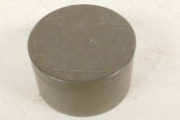 Swedish pewter, Svenskt-Tenn, Sylvia Stave for C.G. Hallberg, a circular stud box, the lid engraved