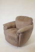 An Italian Natuzzi Gratitudine C163 swivel glider chair in brown suede