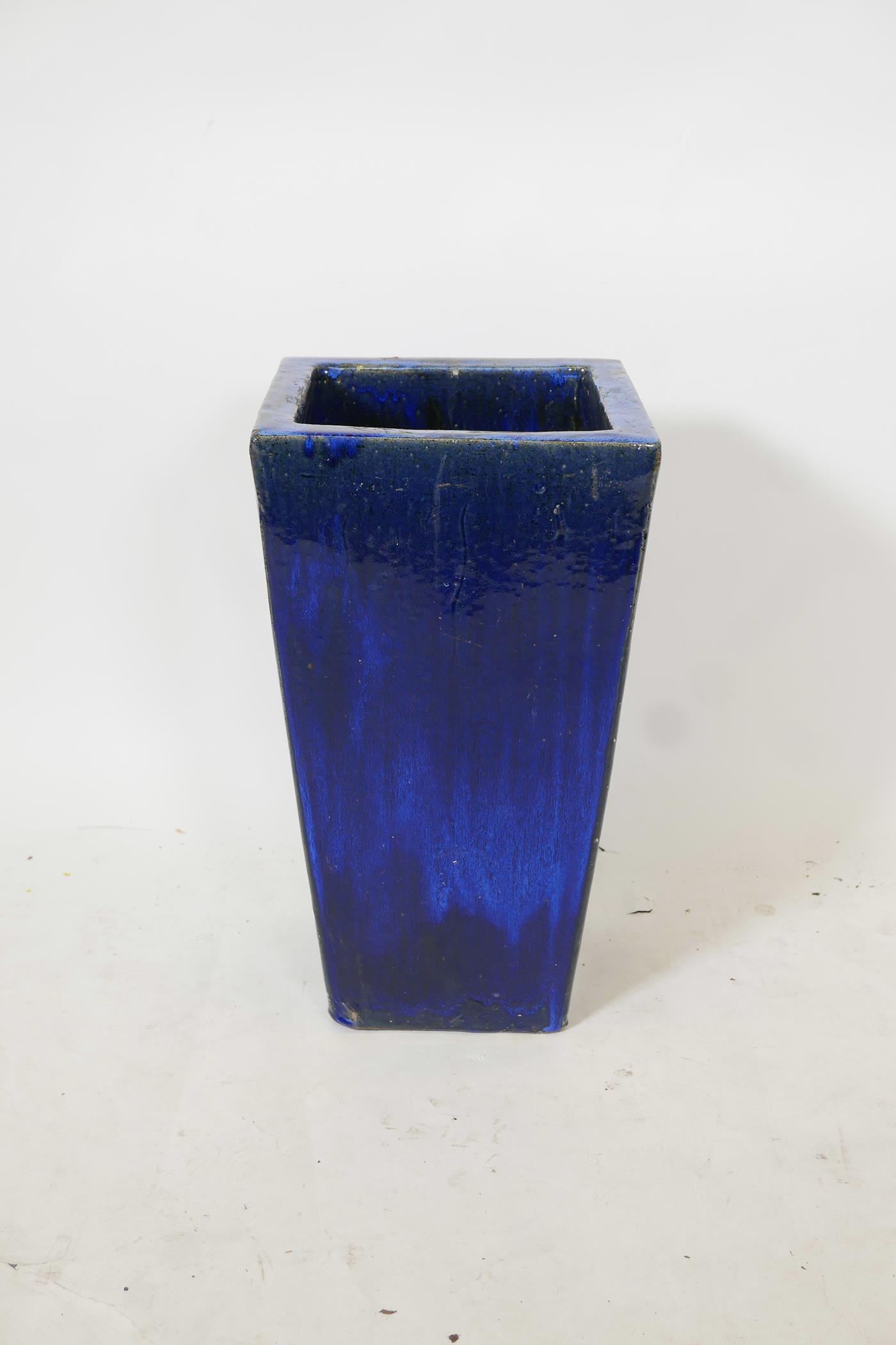 A blue glazed terracotta garden planter, 13" x 13", 23" high