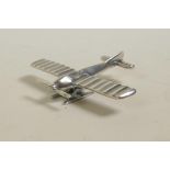 A miniature 925 silver model of a propeller plane, 1½" long