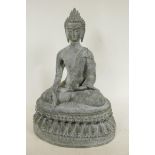 A Chinese bronze figure of Buddha seated in meditation on a lotus throne, 13½" high