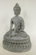 A Chinese bronze figure of Buddha seated in meditation on a lotus throne, 13½" high