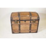 A C19th stripped fruitwood and deal dome top chest with iron strapping, 36" x 21"x 28" high