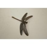 A Japanese Jizai style bronzed metal dragonfly with articulated wings and body, 3" long