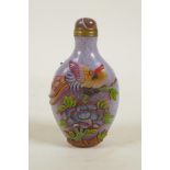 A Peking glass snuff bottle with raised and enamelled decoration of Asiatic birds and flowers, 3½"