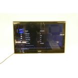 A Samsung 40" television, model UE40B7020WW, lacks stand