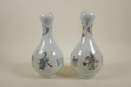 A pair of Chinese polychrome porcelain garlic head shaped vases decorated with four Immortals,