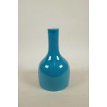 A Chinese turquoise glazed mallet shaped porcelain vase, 6 character mark to base, 8½" high