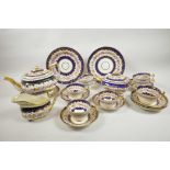 A Regency Coalport part tea service, c.1820, London shape teapot, 10" wide x 6" high, and stand,