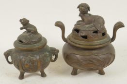 Two small Chinese bronze censers with cast covers, largest 3½" high