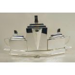 A Christopher Dresser style three piece silver plated teaset on a fitted tray, 16" wide