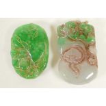 Two carved jade pendants, 2" long