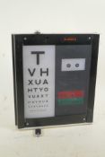 An optician's portable optical light box, by Sussex Vision, 11½" x 13"