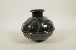 A black glazed studio pottery vase by Peter Hale, signed to base, 6½" high
