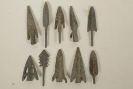 A collection of ten archaic bronze arrowheads, 3½" longest