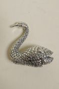 A sterling silver brooch in the form of a swan, 1½" high