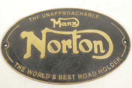 A replica cast metal advertising sign for Norton Motorcycles, 13" x 8"
