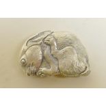 A silver plated vesta case in the form of a rabbit, 2½" long