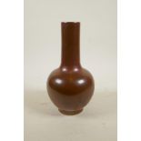 A Chinese copper glazed porcelain bottle vase, 6 character mark to base, 9½" high