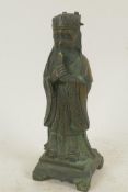 A Chinese bronze figure of a standing Immortal in fine robes, 10" high