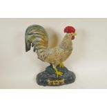 A painted cast iron doorstop in the form of a cockerel, 13½" high