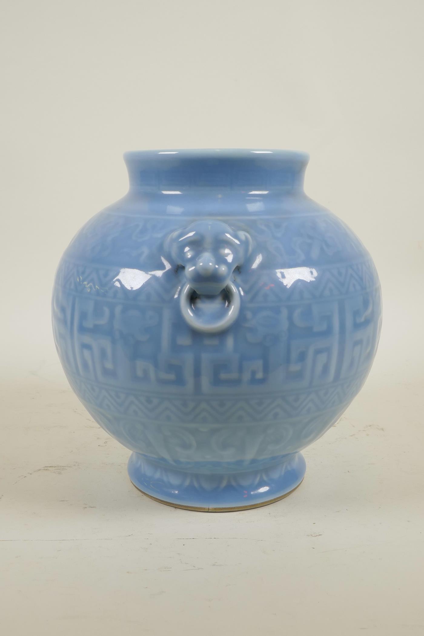A Chinese duck egg blue glazed vase with two lion mask handles and underglaze archaic decoration, - Image 4 of 5