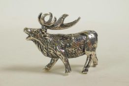 A miniature sterling silver figure of a stag, 1" long