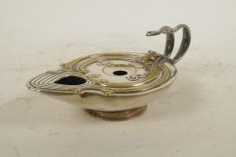 A B&AB patent oil lamp with twin snake handles and Egyptian decoration, 7" x 4"