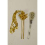 A Chinese white metal hairpin with a carved jade knop, and another Chinese gilt metal twin prong