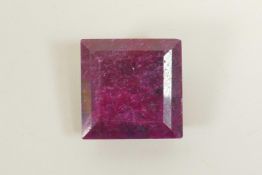 A 215ct natural ruby, square cut, opaque, colour enhanced, certified by Gemological Laboratory of