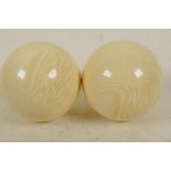 Two composition billiard balls, 2" diameter (164 grams)