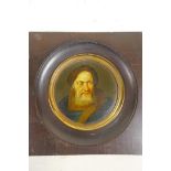 A circular miniature painting on papier mache, possibly Stobwasser, of the Portuguese explorer Vasco