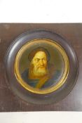 A circular miniature painting on papier mache, possibly Stobwasser, of the Portuguese explorer Vasco