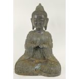 A good Chinese bronze figure of Buddha seated in meditation, his clothing moulded with Buddha