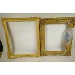 A late C18th/early C19th carved wood gilt picture frame, aperture 18" x 22", together with a C19th