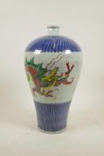 A Chinese blue and white porcelain meiping vase with famille verte enamel dragon decoration, applied