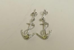 A pair of sterling silver earrings in the form of anchors, 1" drop