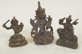 Three miniature Sino-Tibetan bronze figures of Buddhistic deities, largest 3" high