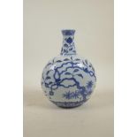 A Chinese Ming style blue and white porcelain moon flask decorated with trees in bloom, 4