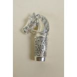 A silver plated cane handle in the form of a horse's head, 3¼" long