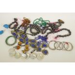 A quantity of ethnic costume jewellery to include bangles, necklaces, beads etc