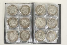 A wallet of sixty facsimile (replica) Chinese coins/medallions, 1½" diameter