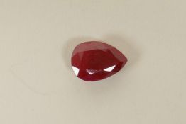 A 12.70ct natural ruby, pear cut, colour enhanced, certified by Gemological Laboratory of India,