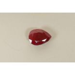 A 12.70ct natural ruby, pear cut, colour enhanced, certified by Gemological Laboratory of India,