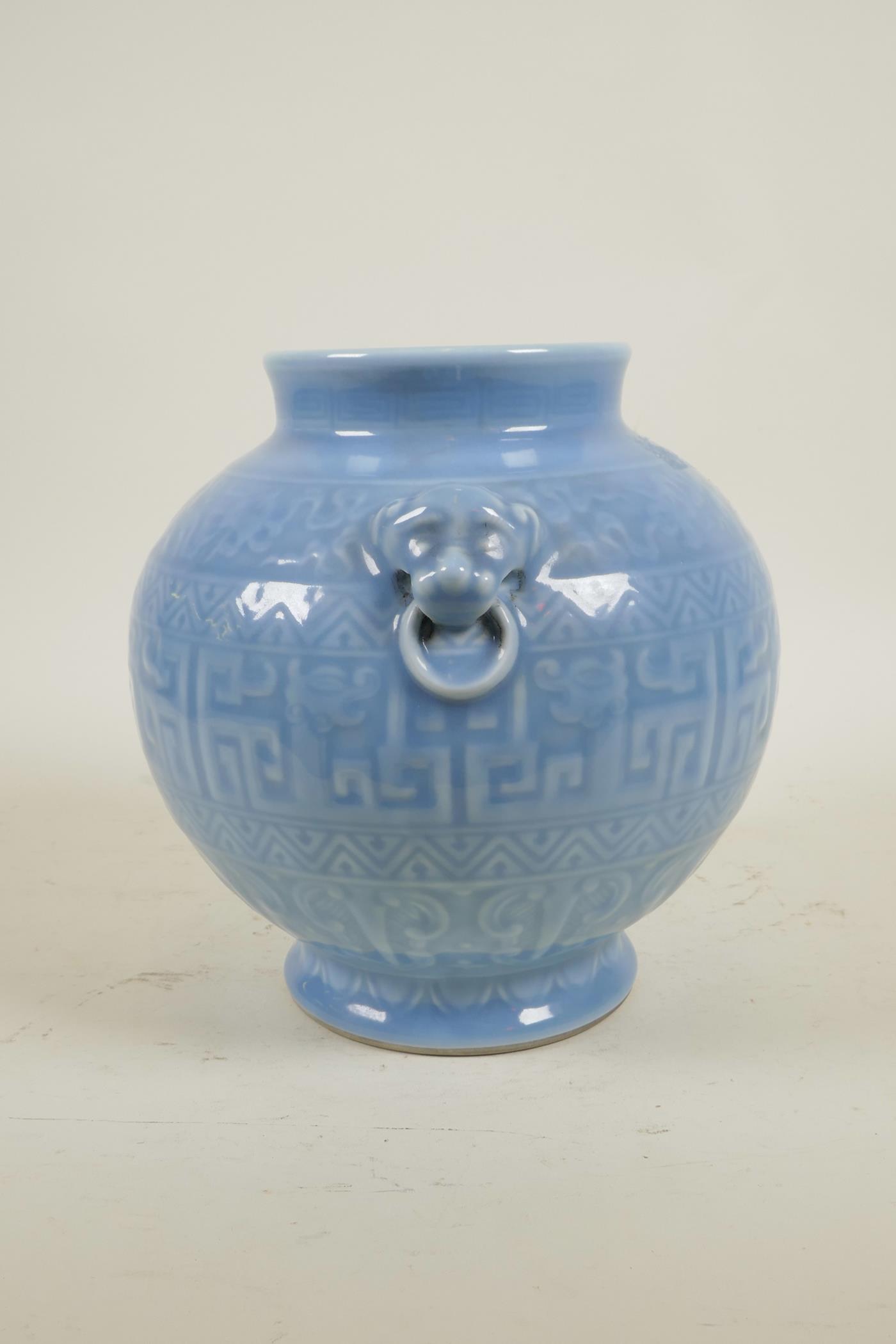 A Chinese duck egg blue glazed vase with two lion mask handles and underglaze archaic decoration, - Image 2 of 5