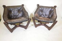A pair of mid century leather and ply 'Luna' lounge chairs by Odd Knutsen